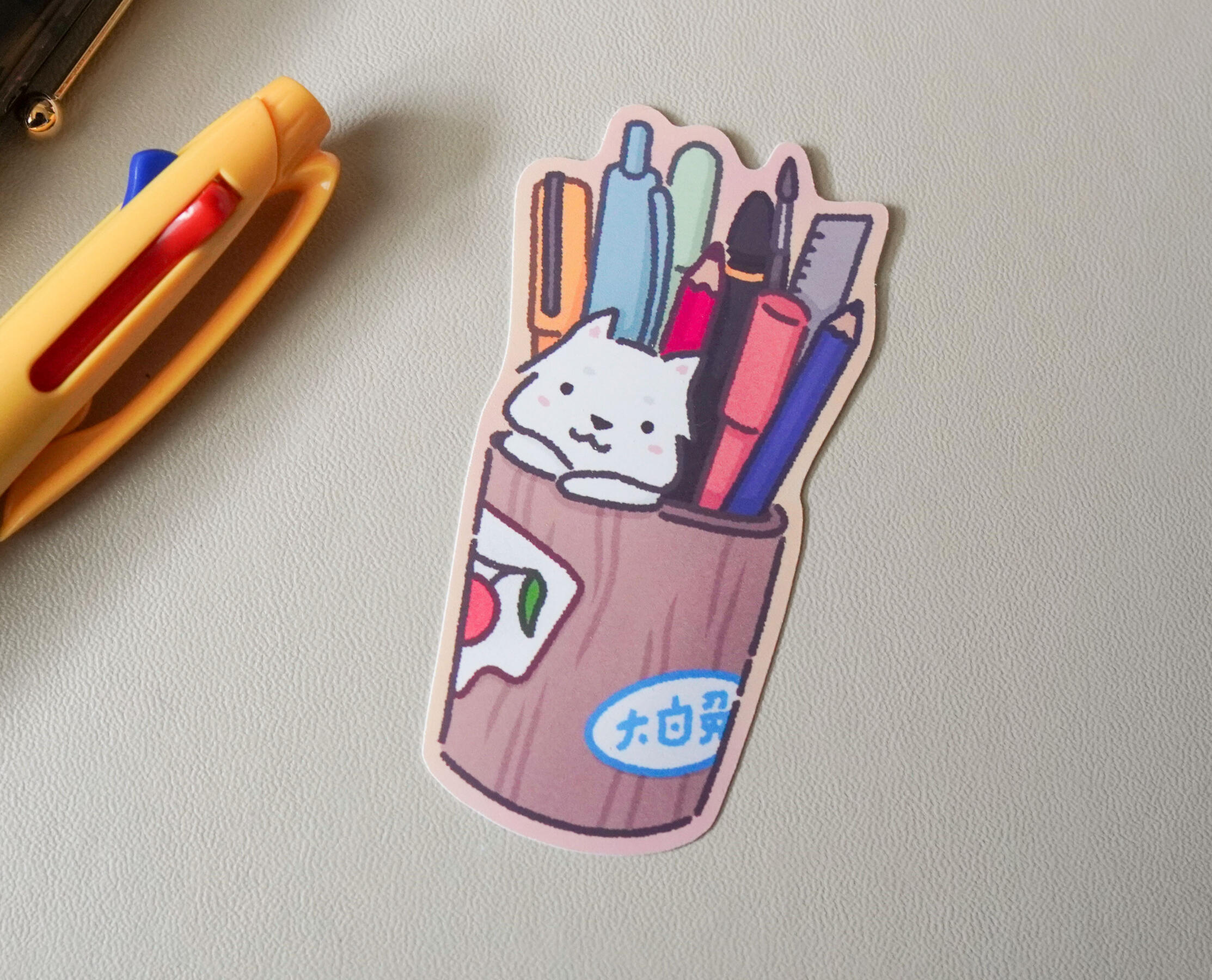 pup in a stationery cup sticker